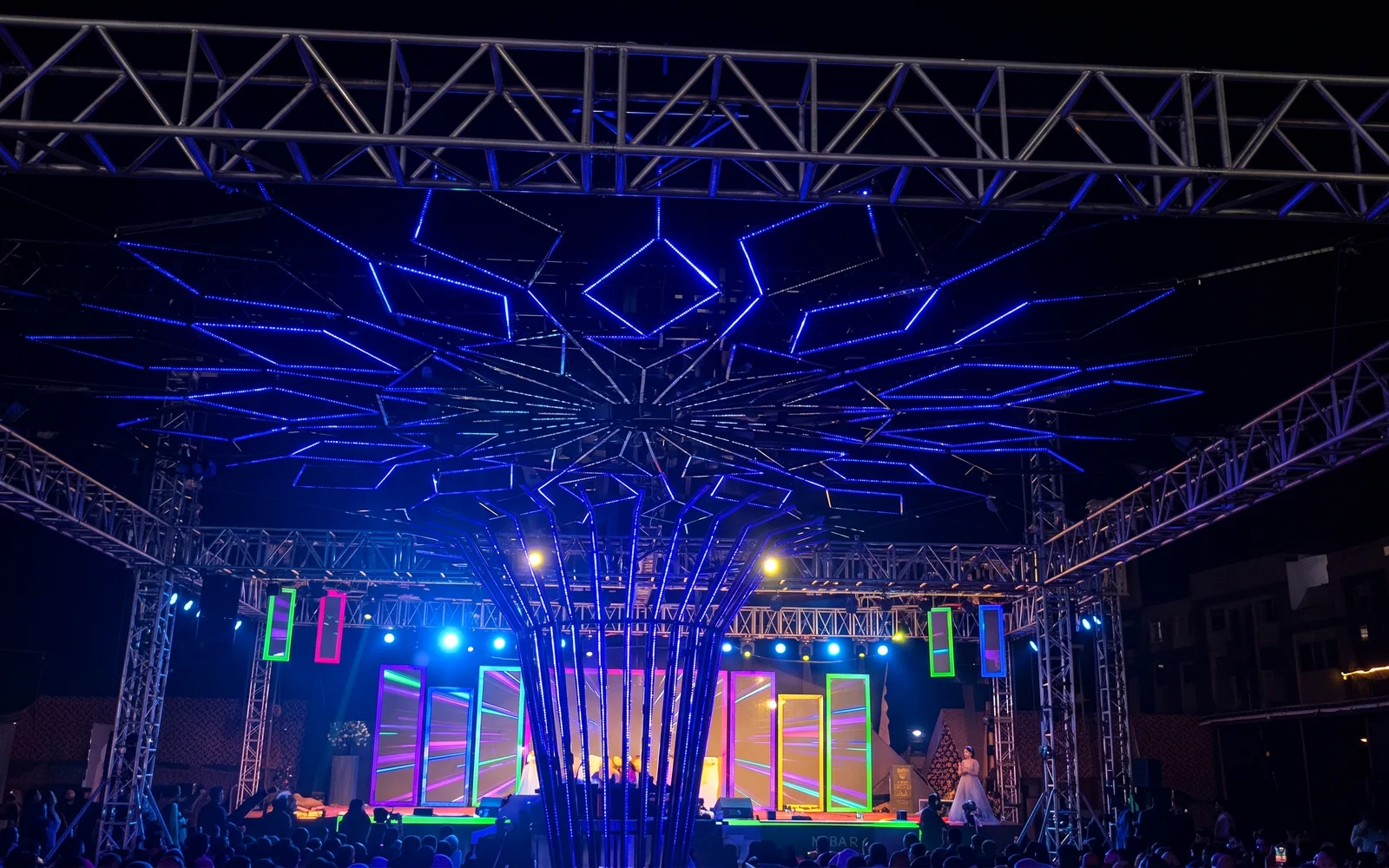 Pixel-bar canopy over a live event stage